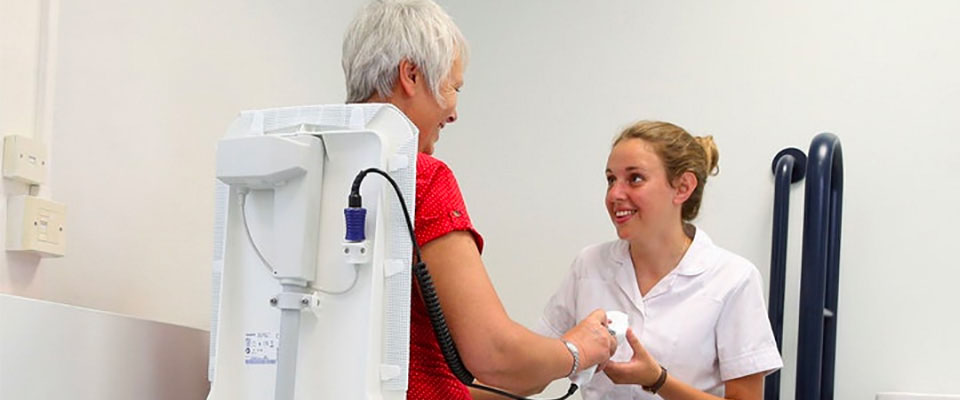 Occupational therapy student with patient