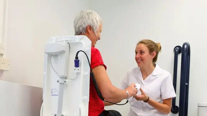 Occupational therapy student with patient