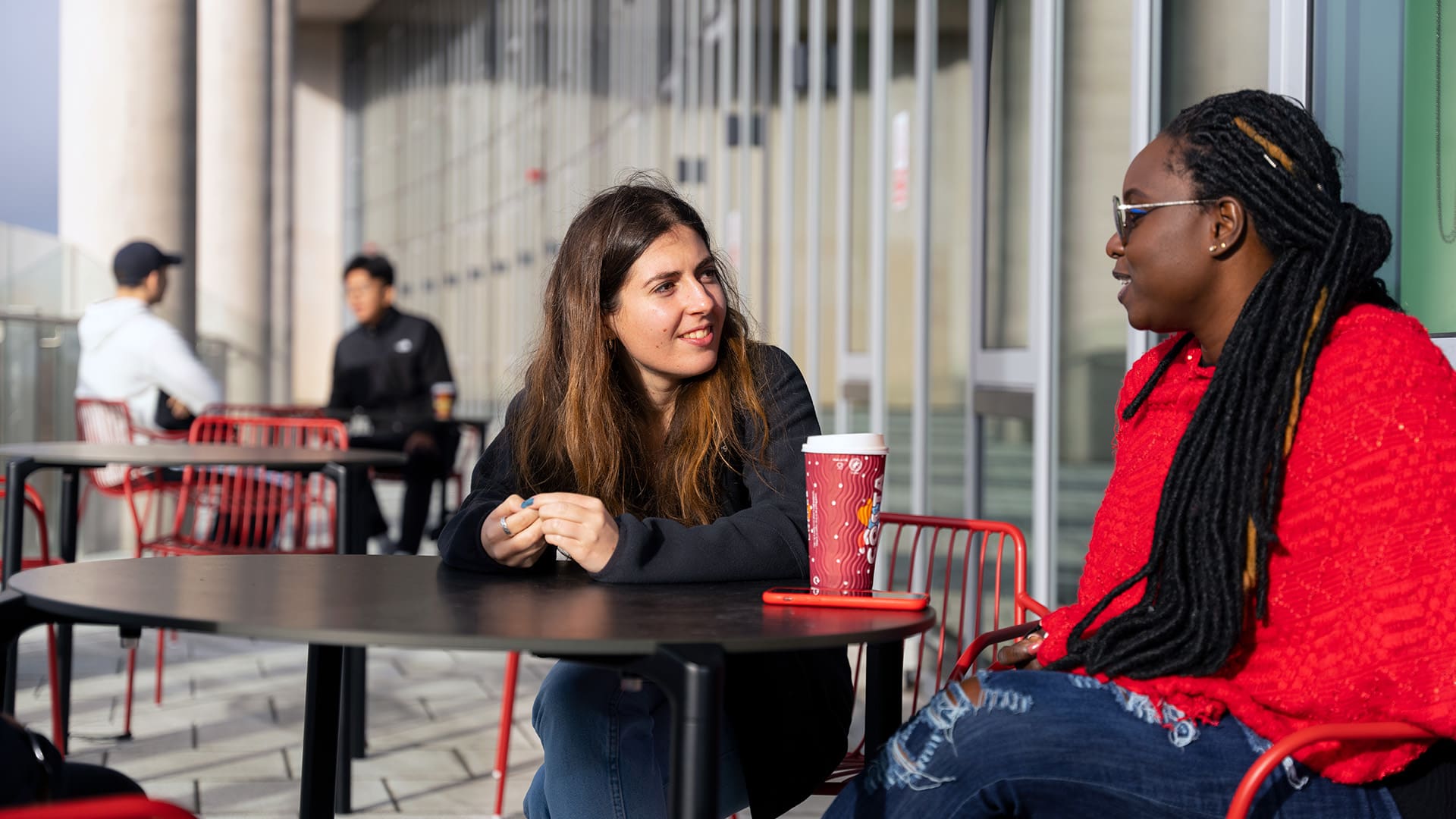 Students having a hot drink